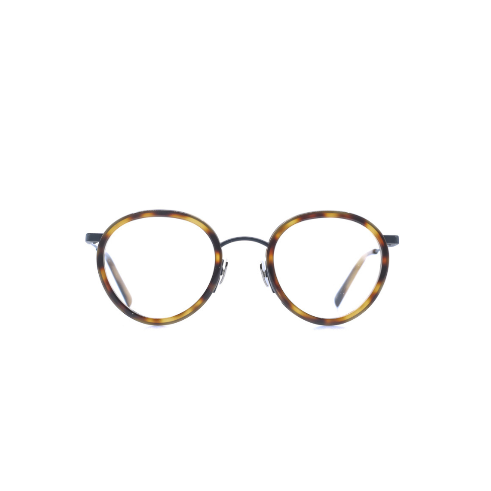 Markant verarbeitete, panto-runde Brille aus Acetat und Edelstahl in Braun-Havana. Mittlere Passform. Frontansicht.