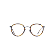 Markant verarbeitete, panto-runde Brille aus Acetat und Edelstahl in Braun-Havana. Mittlere Passform. Frontansicht.