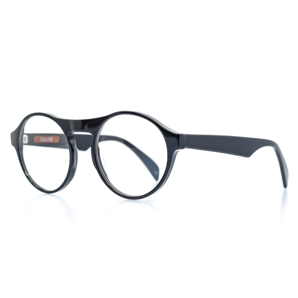 Markante Brille mit auffälligem Steg in Schwarz. Breite Passform. Limitierte Kollektion mit 250 Stück. Seitenansicht.